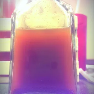 Delta-style vinegar pepper barbeque sauce. Black pepper, cayenne, and other stuff in vinegar. Shake it up and splash it on!