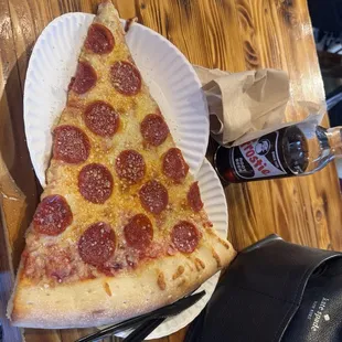 One slice so big it takes two plates to hold it.