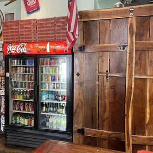 a coca cola cooler in a store