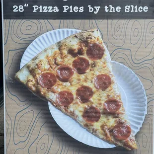 a slice of pizza on a paper plate