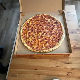 Pictures just don't do it justice! The pizza is almost the size of our average size dining table.