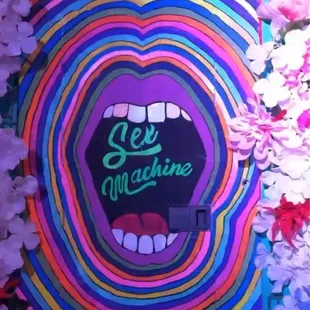 a close up of a colorful poster