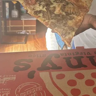 This pizza was humongous and good Feed 7 people.