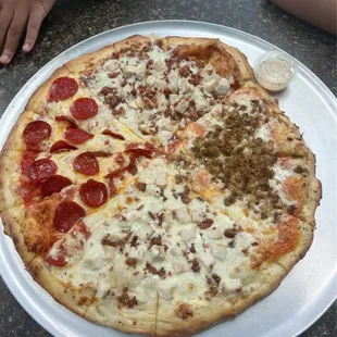 4 way pizza. Bbq chicken, boudain, chicken bacon ranch, and beef pepperoni.