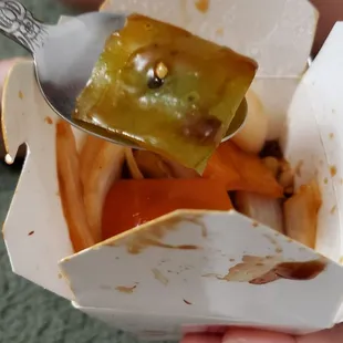a person eating a hot dog