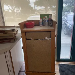 Overflowing trash can