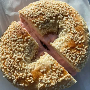 Sesame bagel with strawberry cream cheese