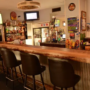 a bar with stools
