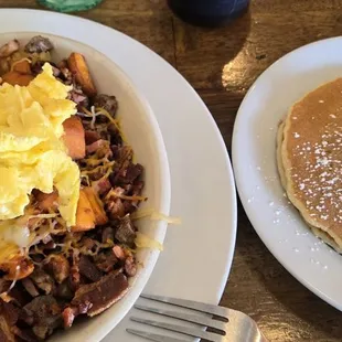 Meat lovers skillet and pancakes.  Added sweet potatoes to the skillet