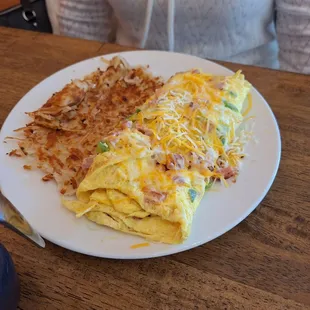 Omelet was pretty tasty..... hash browns not so much