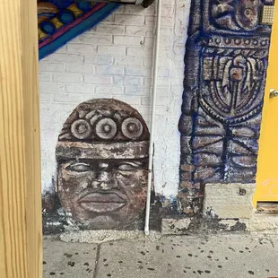 a wall with a face on it