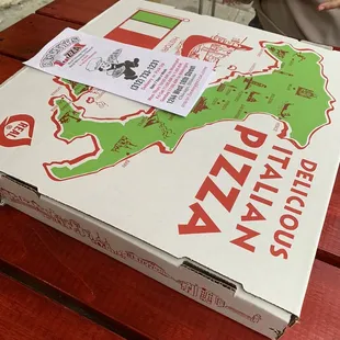 a pizza box on a table