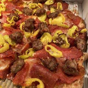 Pepperoni, sausage, banana pepper, extra sauce (a must)