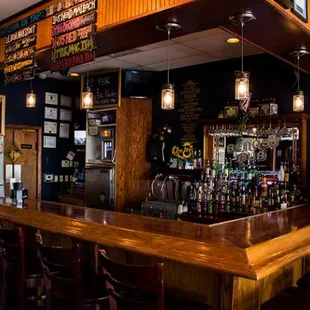 Enjoy a seat at our cozy bar or one of our many dining room tables.