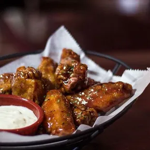 We&apos;ve spent a decade perfecting our Raspberry Chipotle wings!