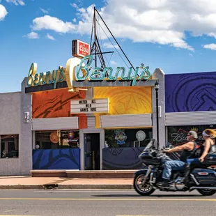two people on a motorcycle
