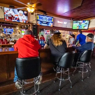 people sitting at the bar