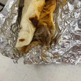 a burrito wrapped in foil