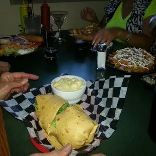 Bunch of salads and their "baked potato fries"