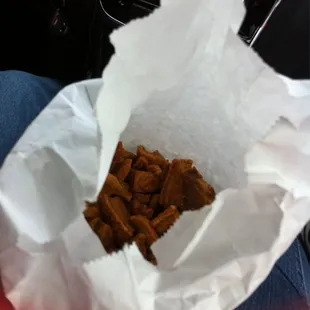 Warm crackling by the pound.