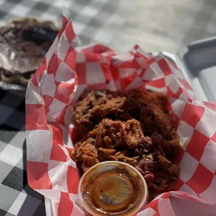 Pulled pork and a buttermilk pie in the background