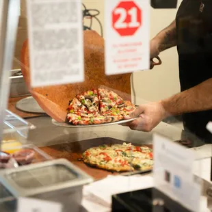 a pizza being prepared