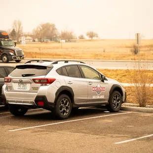 two cars in a parking lot
