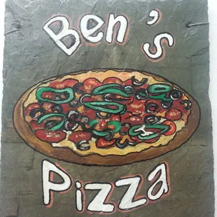 ben&apos;s pizza on a slate sign