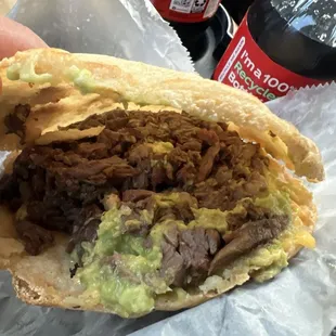 Plain Gordita with guacamole and cheese.
