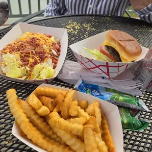 Houseboat salad, cheeseburger, and seasoned fries