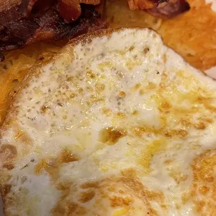 an omelet with bacon and eggs