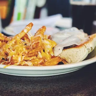 Prime rib sandwich and cheese fries
