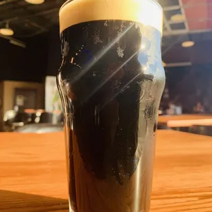 a pint of dark beer