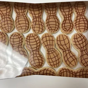 Sugar cookies decorated to look like peanuts.