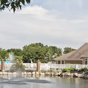 Clubhouse with Pond and Pool view