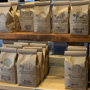 bags of coffee on a shelf