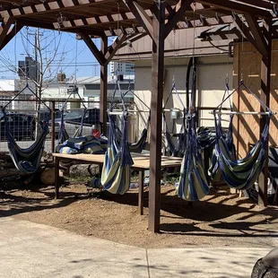 hammocks hanging from a pergol