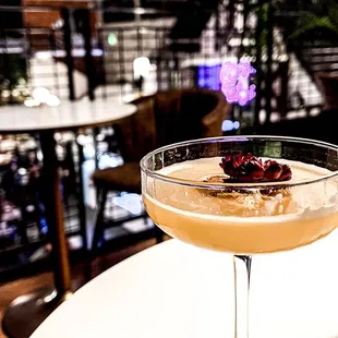 a cocktail in a coupe glass