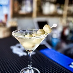 a martini with olives