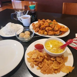 Egg drop soup, fried sesame balls, orange chicken and rice, Jasmine tea