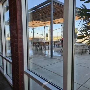View of outdoor patio from inside.