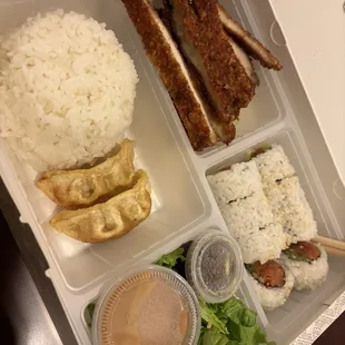 Bento Box with ENT-Chicken Karaage, ROLL- Spicy Tuna, SALAD- House, dumplings