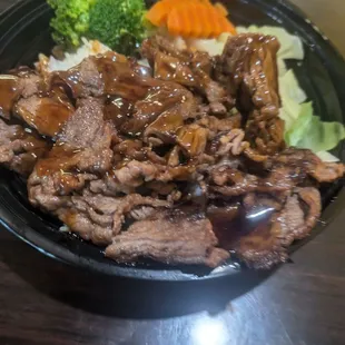 Very delicious. It's the steak bowl. Lots of meat and rice on bottom