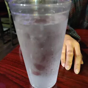 a glass of water on a table