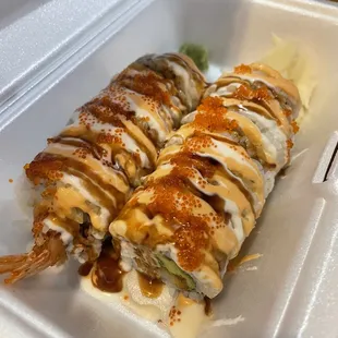 a close up of a roll with sauce