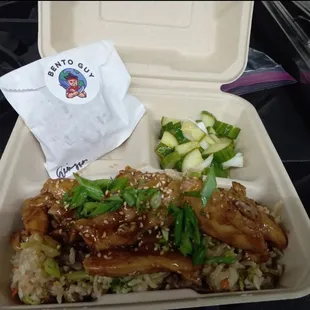 a meal in a styrofoam container