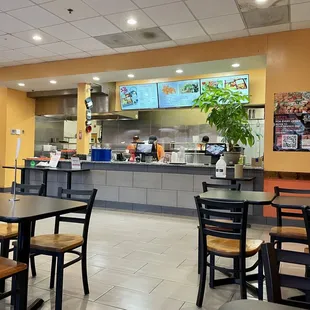 Inside of restaurant with view of ordering counter. Order and pay at counter. Clean and neat inside.