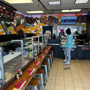 Seating next to Sushi station.