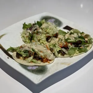 two tacos on a plate