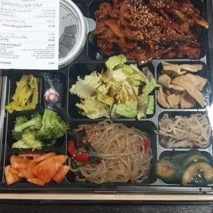 "Bento" means sectioned box as dinner plate.  I'm